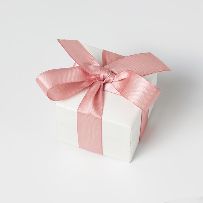 Box with pink ribbon